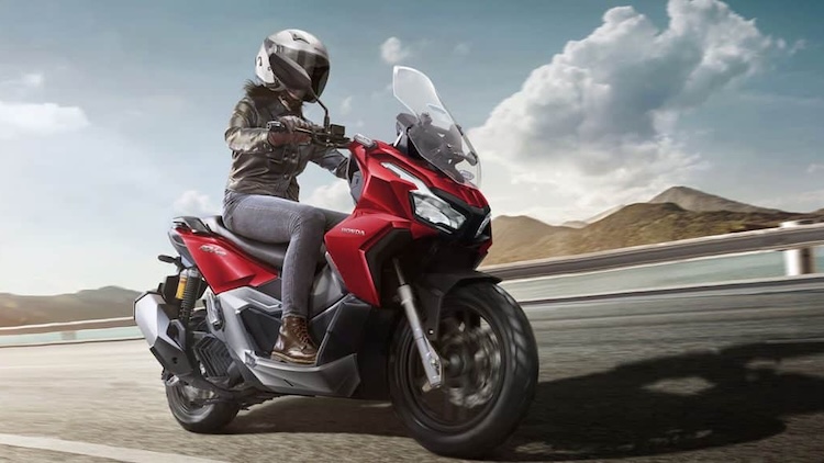 Honda ADV 160: Motorcycle For Keeps Woman riding on Honda ADV 160 Motorcycle
