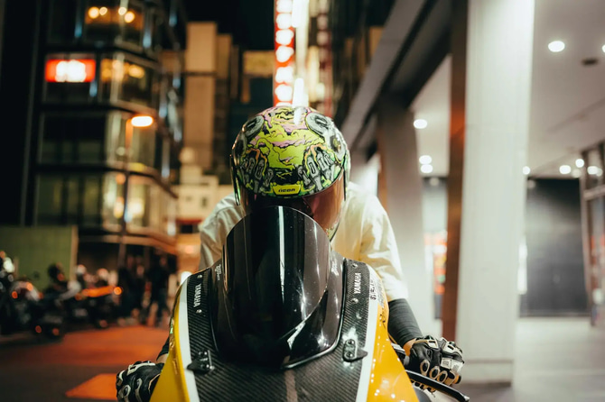 person riding a Motorcycle on Akihabara Japan